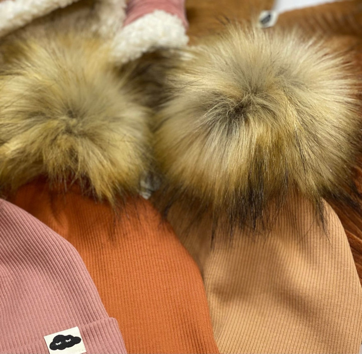 Pompon supplémentaire